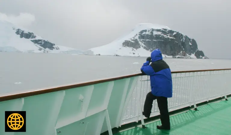 A person on the deck of an Antarctica cruise ship